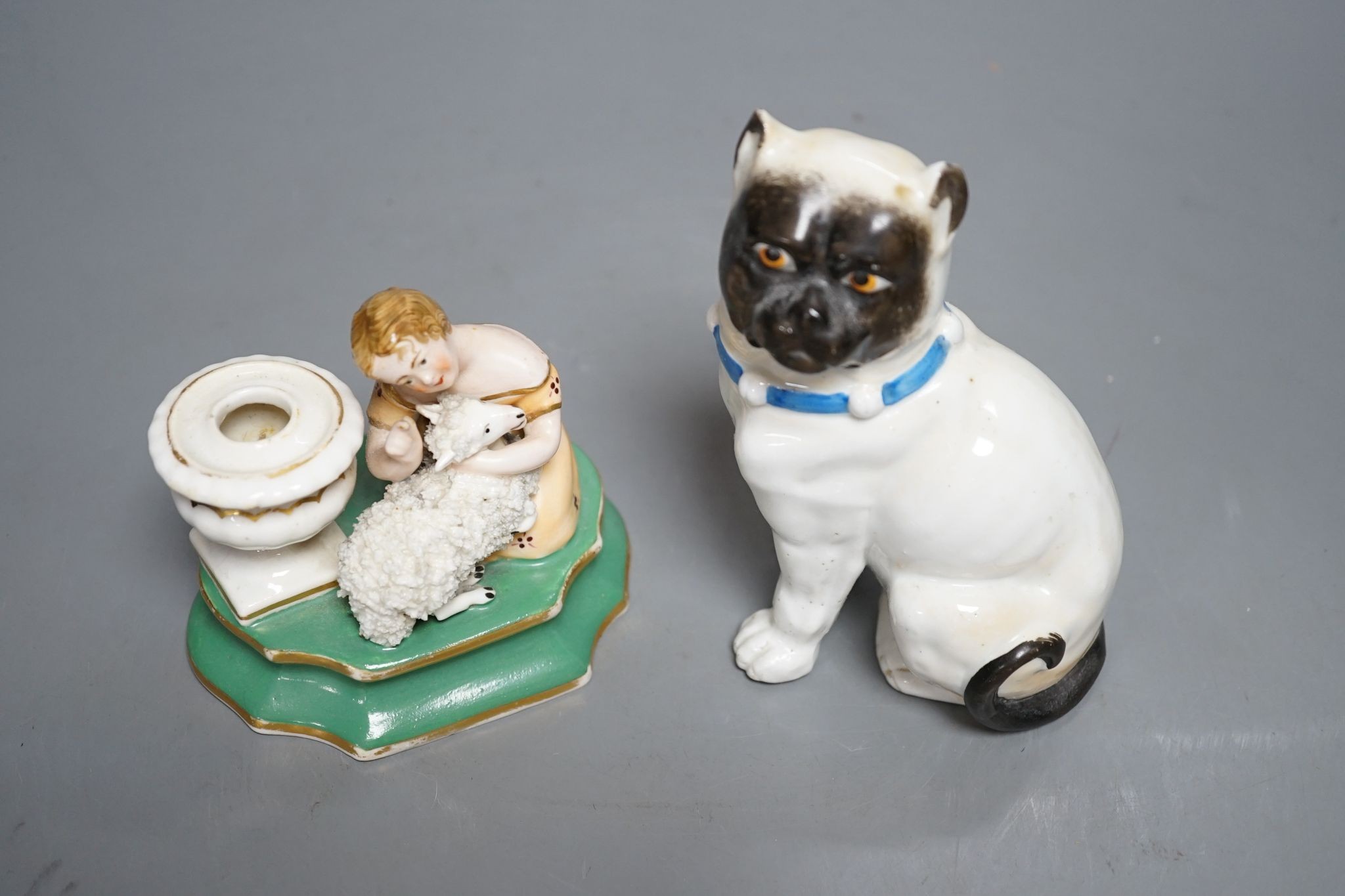 An English porcelain girl with sheep inkwell, c.1835 and a Continental porcelain pug dog, 14cm
